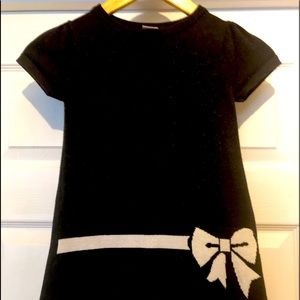Black short knit dress for girls with festive bow